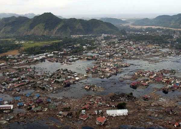 A village near the coast of Sumatra that was badly hit by a tsunami.  / Source: Philip A. McDaniel, Wikimedia Commons (Public domain)